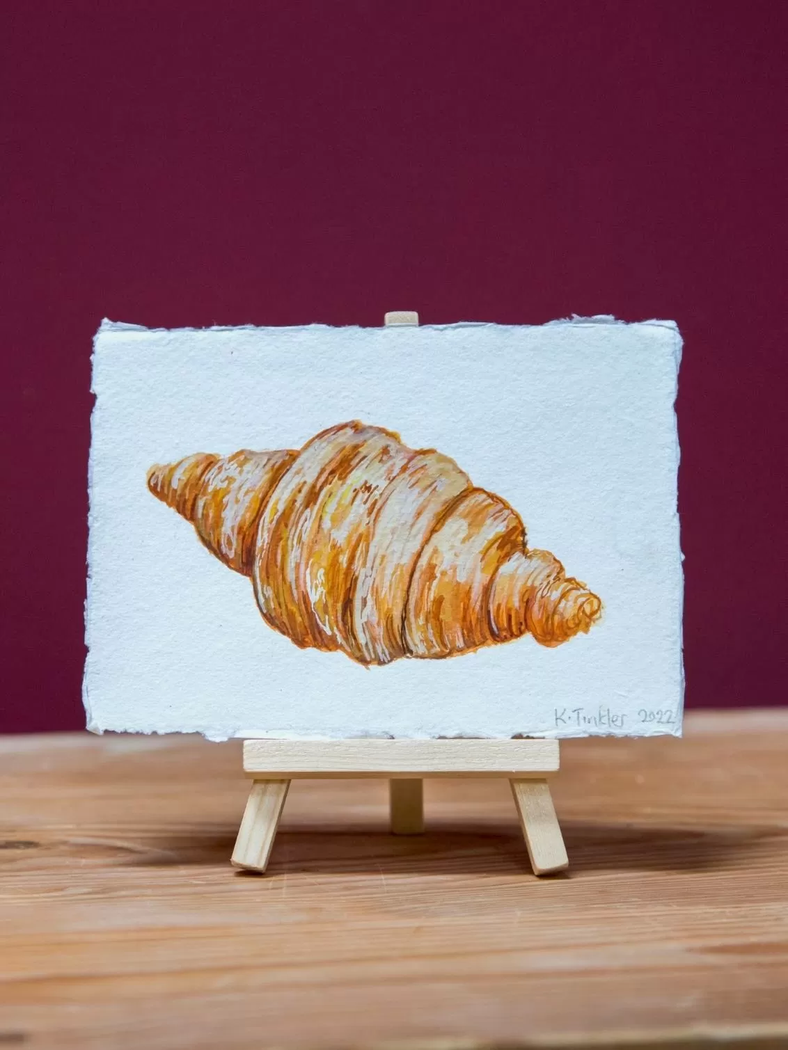 Katie Tinkler illustration of a Croissant.