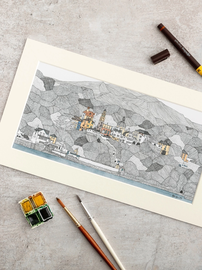 Print of detailed pen and watercolour drawing of Portmeirion and welsh hills, in a soft white mount