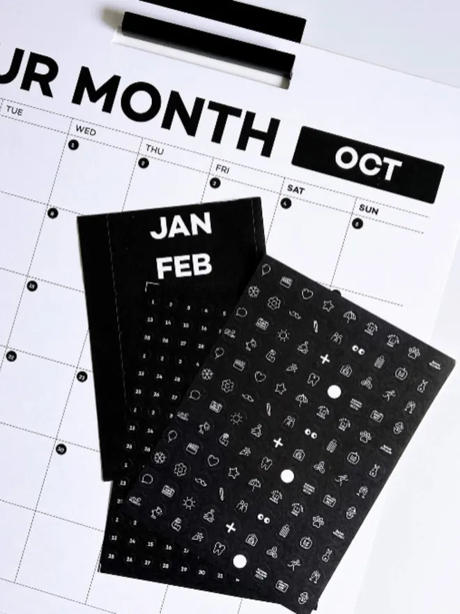 Hello Time weekly wall planner with black sticker sheets for months and icons