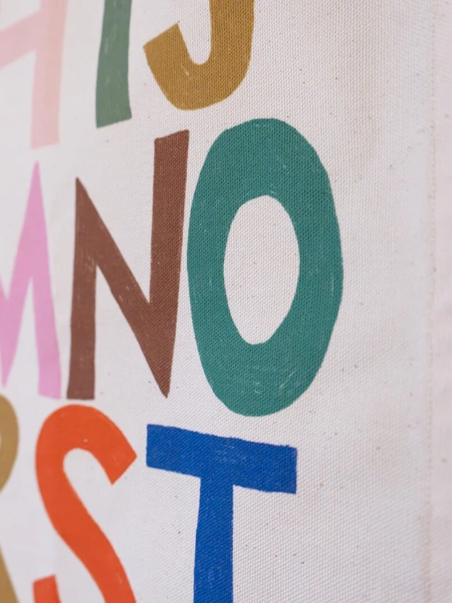 Rainbow Alphabet Fabric Banner, close up. 