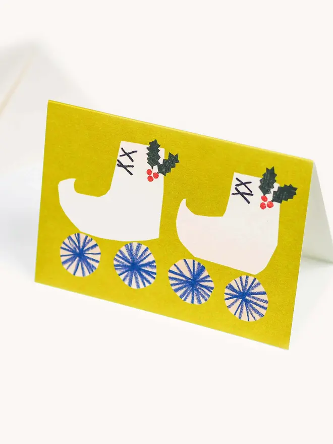 green card with christmas rolle skate design