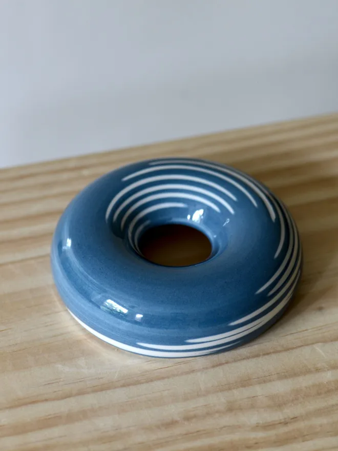 Avocado Planter White & Blue Handmade porcelain avocado planter with carved blue pattern, designed to hold an avocado seed for sprouting