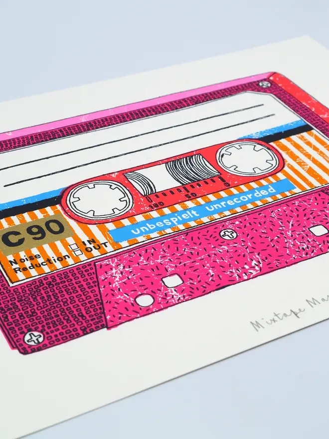Personalised Pink Mix Tape Screenprint Mixtape Mash Up, a pink mixtape design on a white screenprint. It sits on a baby blue backdrop. 