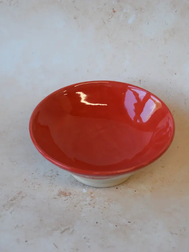 Handmade scalloped edge trinket dish - top view showing glossy red glaze