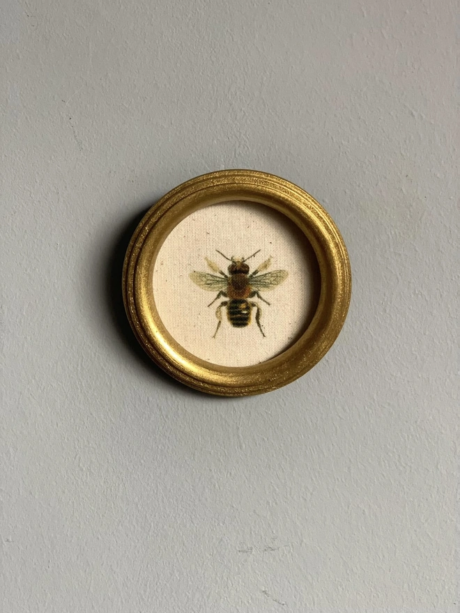 Miniature bee print in repurposed frame