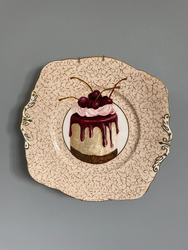 cherry cake painting on plate