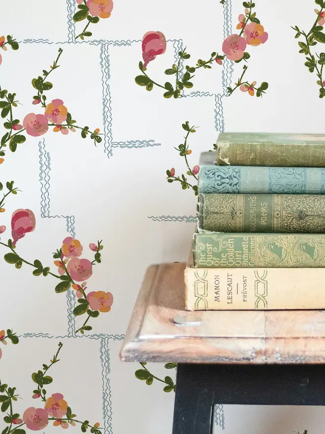 Coco Wallpaper, a living room with a decorated floral wallpaper. 