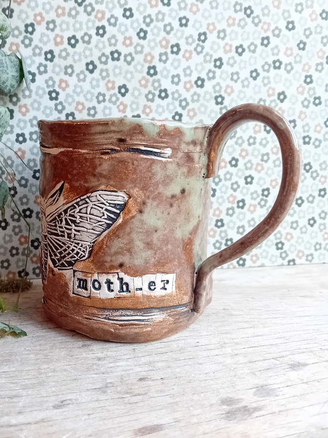 brown 'moth er' mug