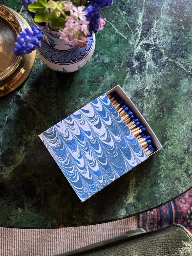 Square Matchbox. A matchbox in blue.