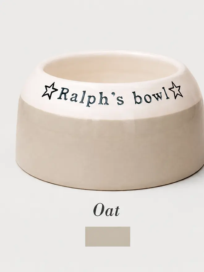 Personalised Cocker Spaniel Bowl in buff oat colour, decorated with the words Ralph's Bowl.