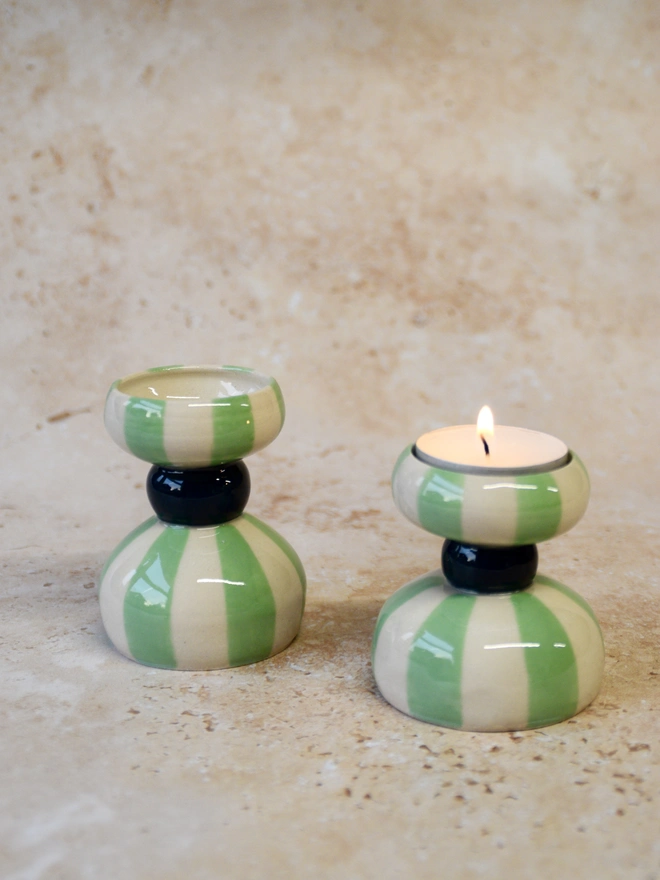 Pair of handmade striped ceramic candlestick holders in green tones