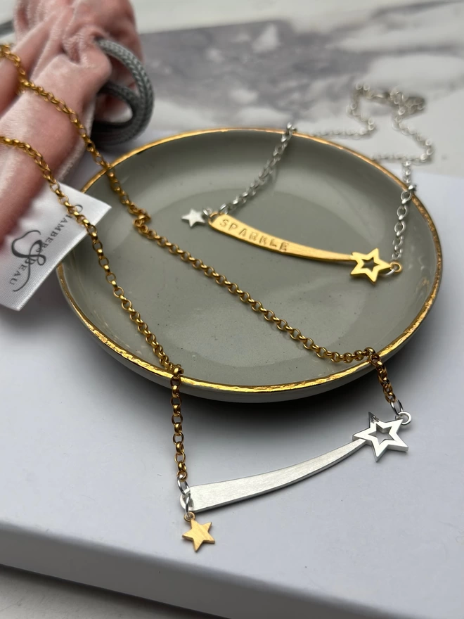 sterling silver chain with gold shooting star charm and silver mini star