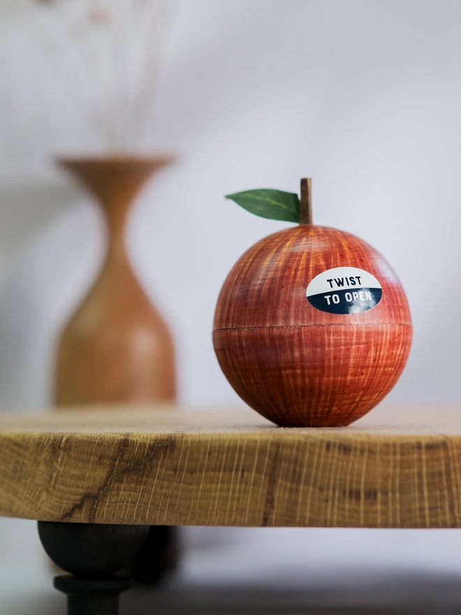 wooden apple ornament with secret message inside