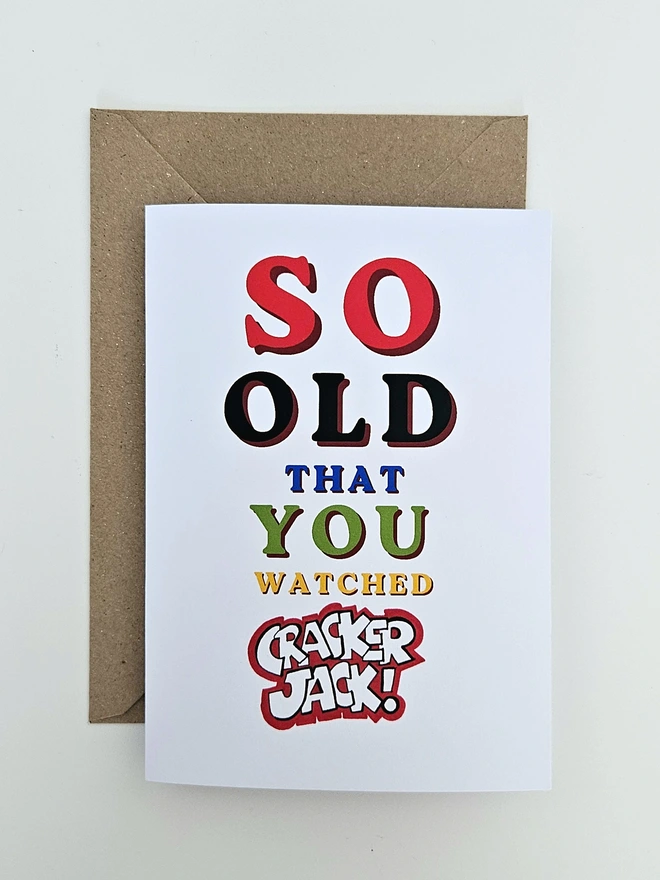 A nostalgic card that says So old that you watched Cracker Jack in colourful retro style fonts on a white background. 
