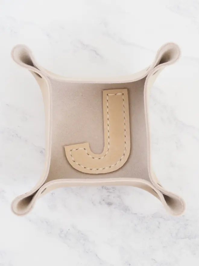 mini leather coin tray with personalised letter shape