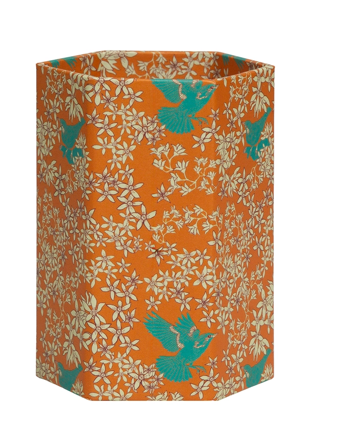 Corali Hexagonal Brush Pot, a colourful patterned pencil pot sitting on a white surface against a plain backdrop.