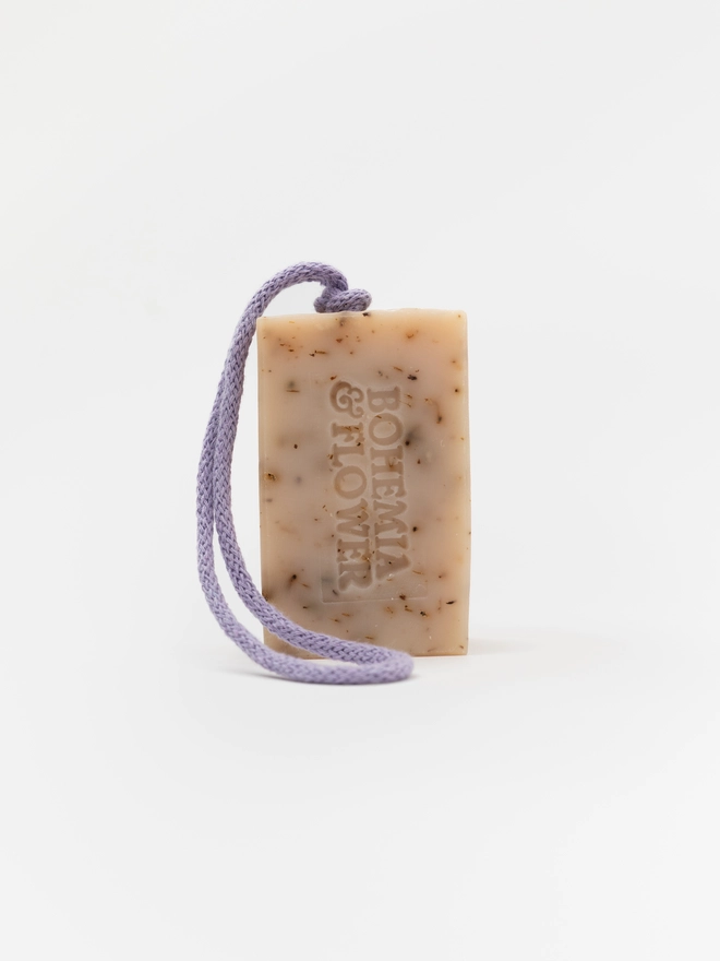 Mountain Soap on a Rope hanging by its colourful British-made rope – a calming yet modern lavender and patchouli soap, perfect for slow living and sustainable self-care