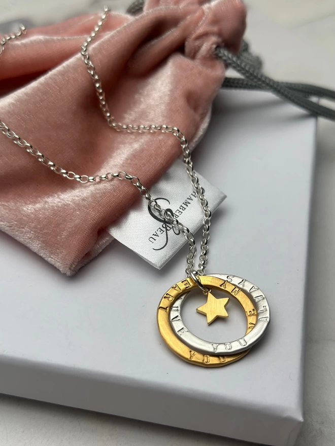 sterling silver chain with personalised intertwined open circle charms in sterling silver and gold plate with gold mini star charm