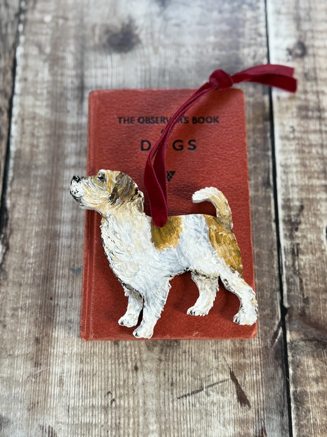 Wire Haired Jack Russell Dog Christmas decoration strung with red velvet ribbon