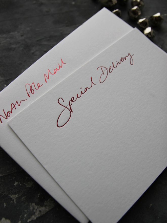christmas notecard with Special Delivery in red foil comes with envelope which says North Pole Mail
