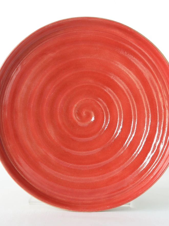 red ceramic plate