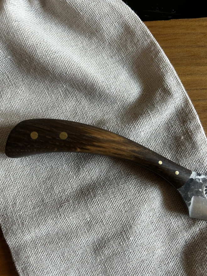 Dark Handled Knife Close Up