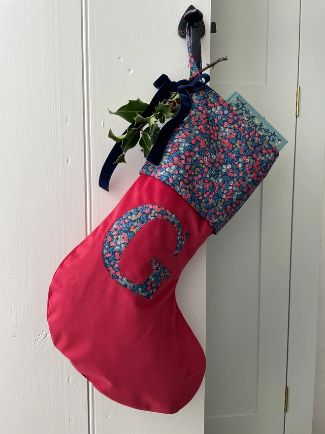 Red velvet stocking with liberty print letter and cuff