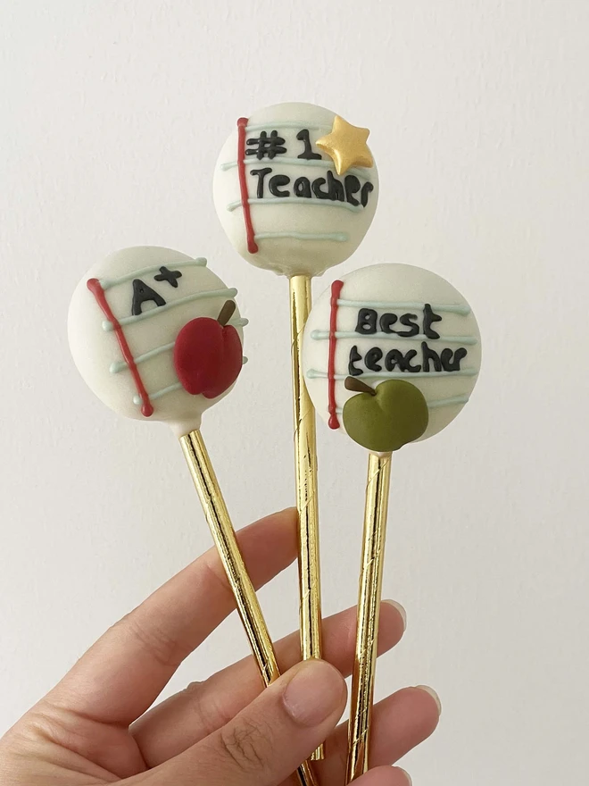 Teacher Thank You Cake Pops  (Pack Of 6, 12, 18, 24), held in hand showing size and detail.
