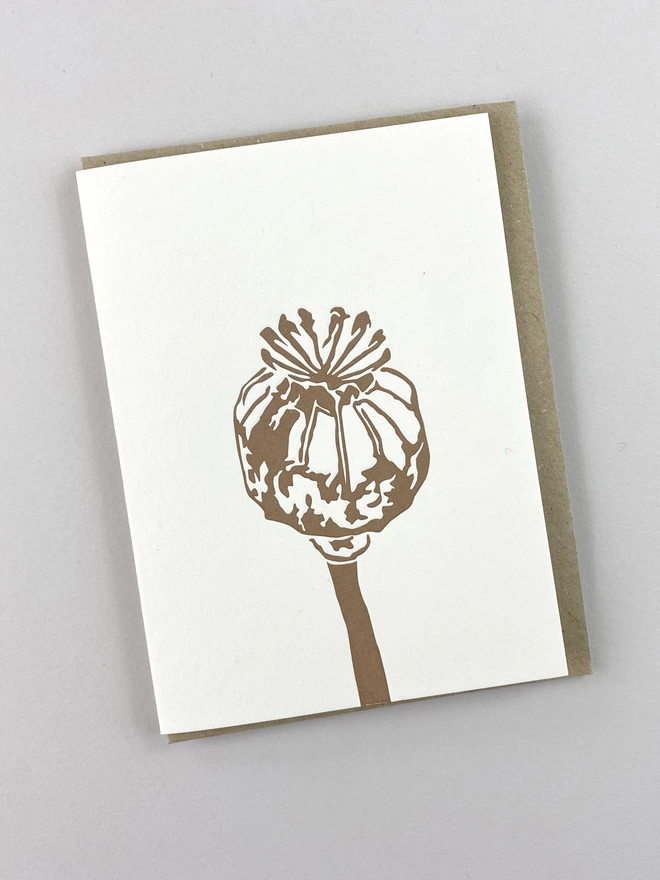 Metallic bronze gold Poppy letterpress design on small card