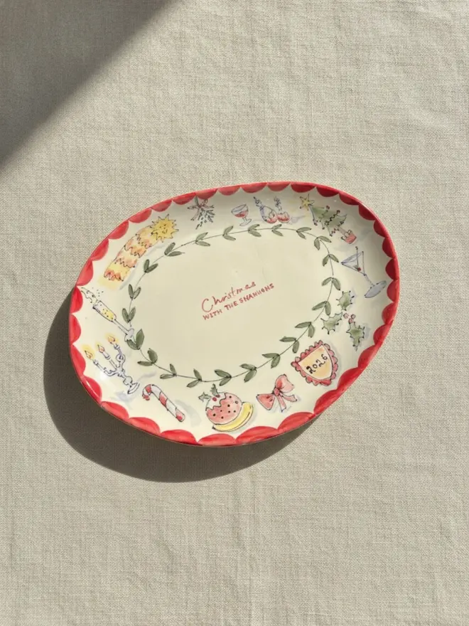 Personalised Christmas design Plate with a red trim