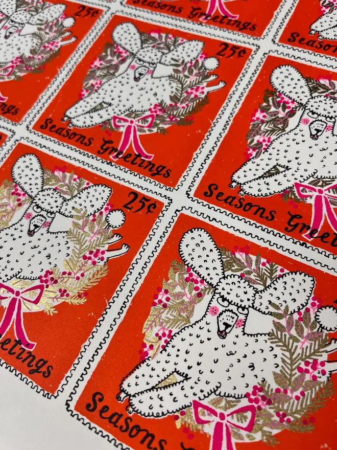 Christmas Poodle Card, a group of Christmas cards with colourful designs in the centre. They are placed on a white surface. 
