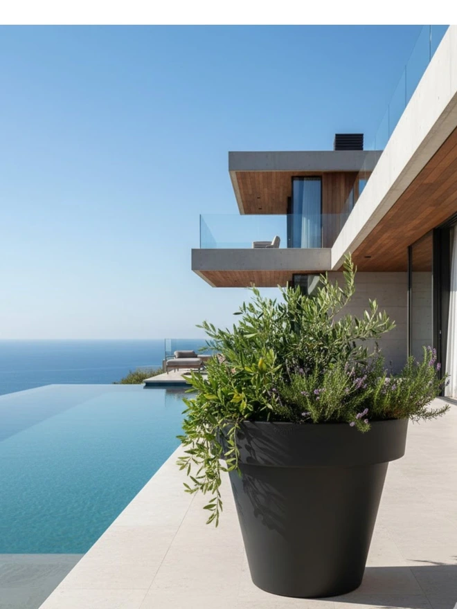 The anthracite Tubby delivers a contemporary charcoal finish paired with a substantial low-profile silhouette. Its modern neutral colour suits architectural gardens, urban terraces and professional landscaping schemes. Made from robust yet lightweight material, it’s built for year-round, outdoor use with minimal maintenance.