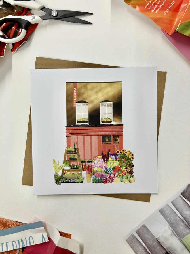 Greetings Card with a collaged illustration of Columbia Road Flower Market with an envelope on a white background with collage materials.