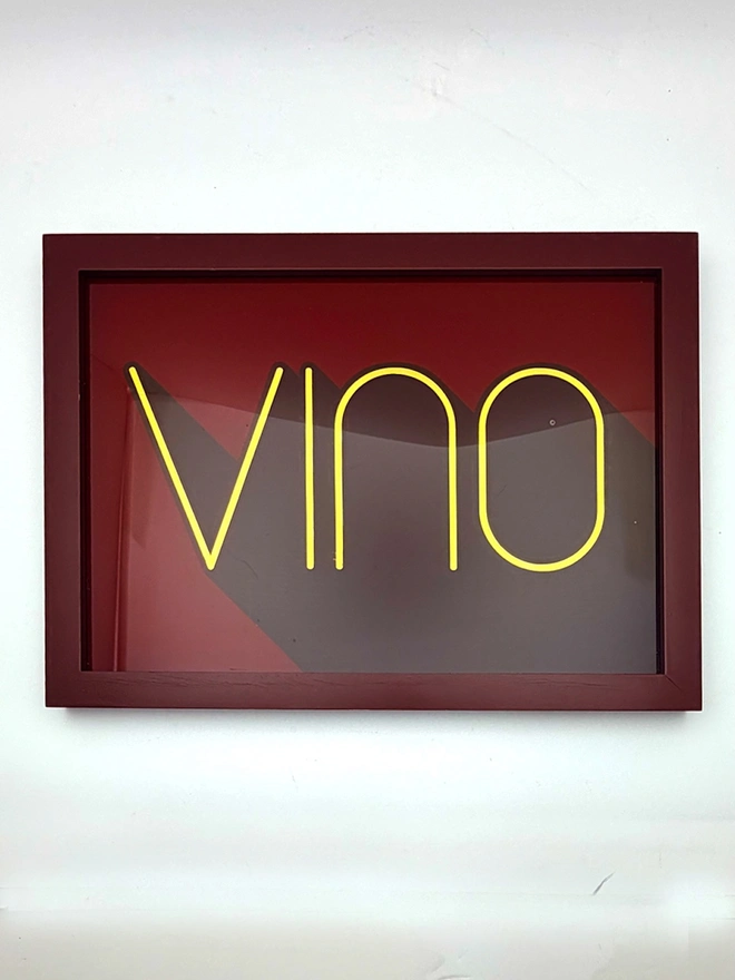 'Vino' Wine Serie Gold Leaf Glass Artwork, hanging in an exposed brick wall. 