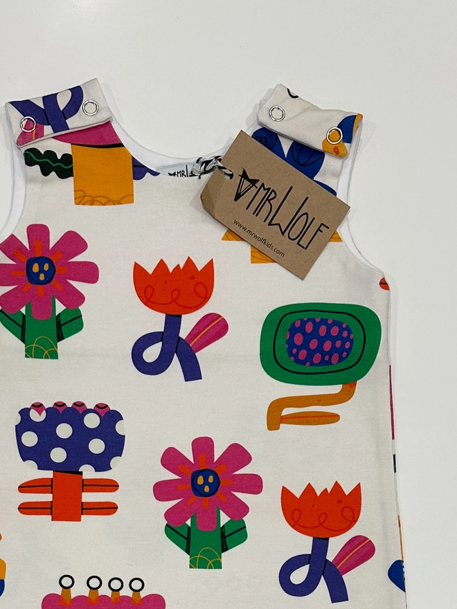 Baby romper in collage flower print fun baby romper colourful and bright