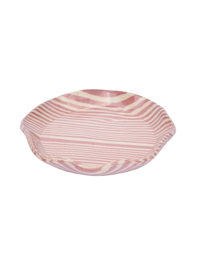 Striped Trinket Dish, a colourful trinket dish sitting on a white surface against a plain backdrop.