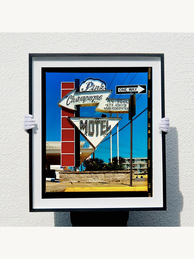 Pink Champagne Motel Framed in Black