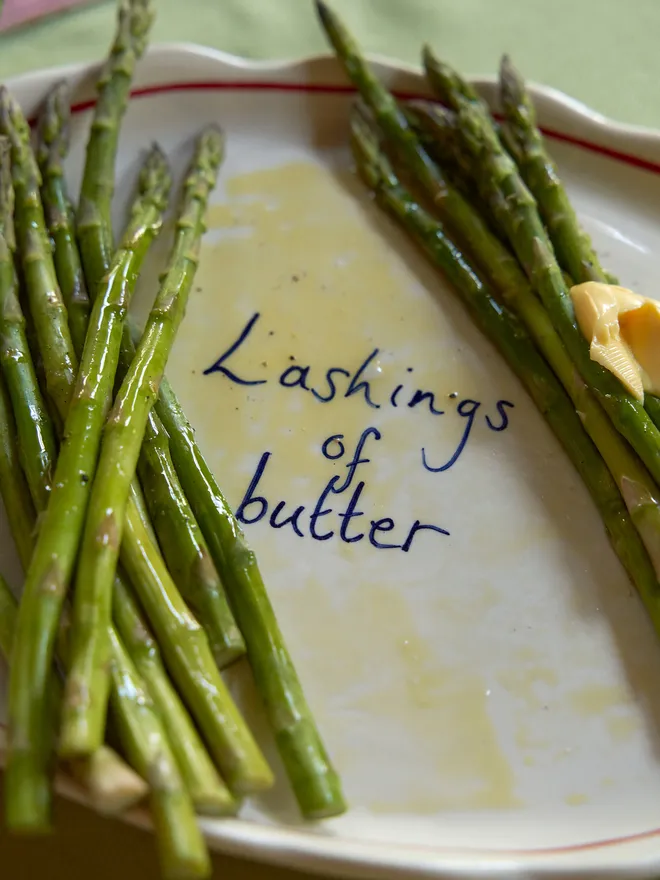 Lashings of butter ceramic asparagus serving dish