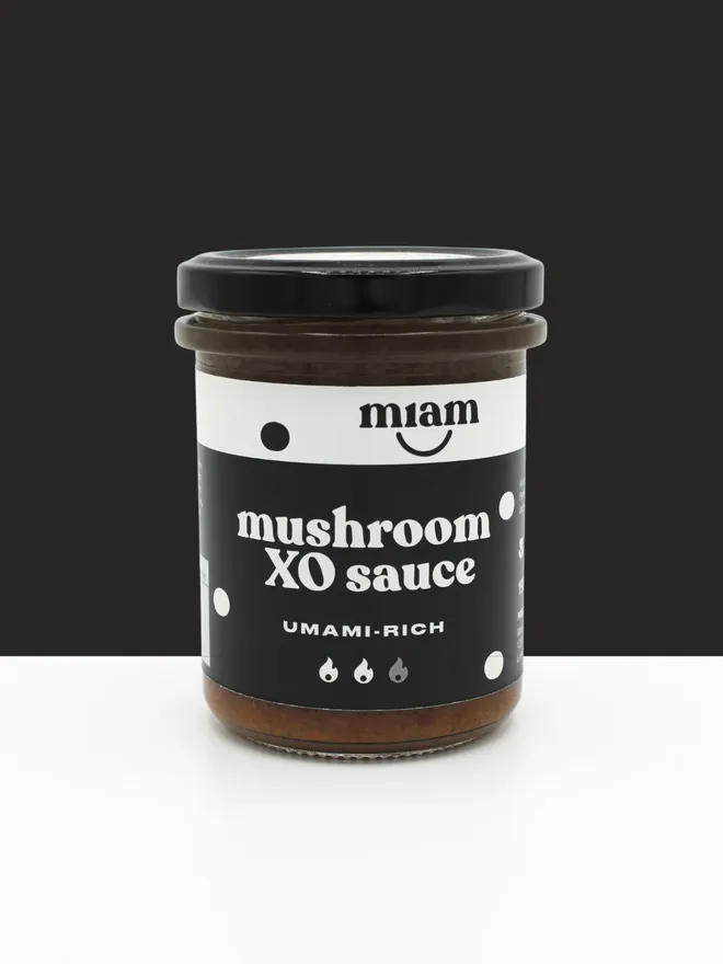 Jar of XO sauce with a black label on a white background
