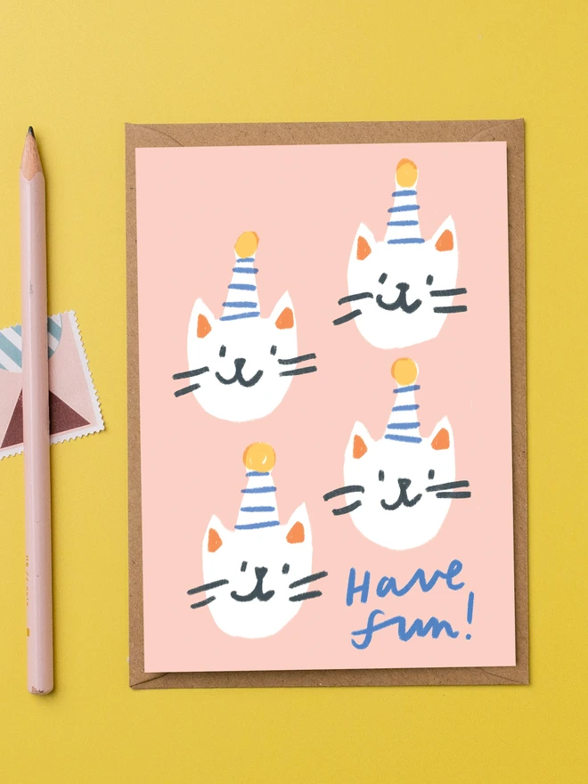 cat birthday card featuring four cats in birthday hats and the words Have fun 