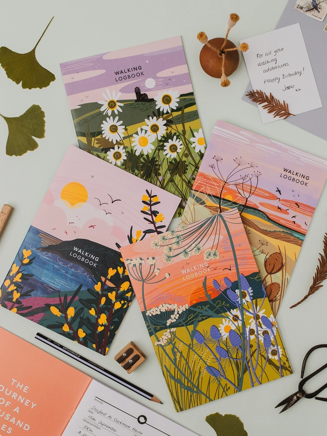 All the walking logbooks together. walking logbook, walking journal, hiking logbook, hiking journal, walk tracker, walking notebook, hiking notebook, rambling journal, countryside gift, outdoor gift, gift for walkers, dog walking journal, nature lover gift