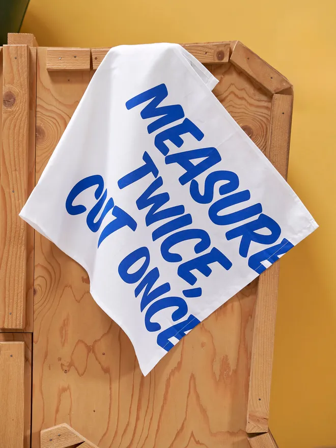 Measure twice cut once tea towel
