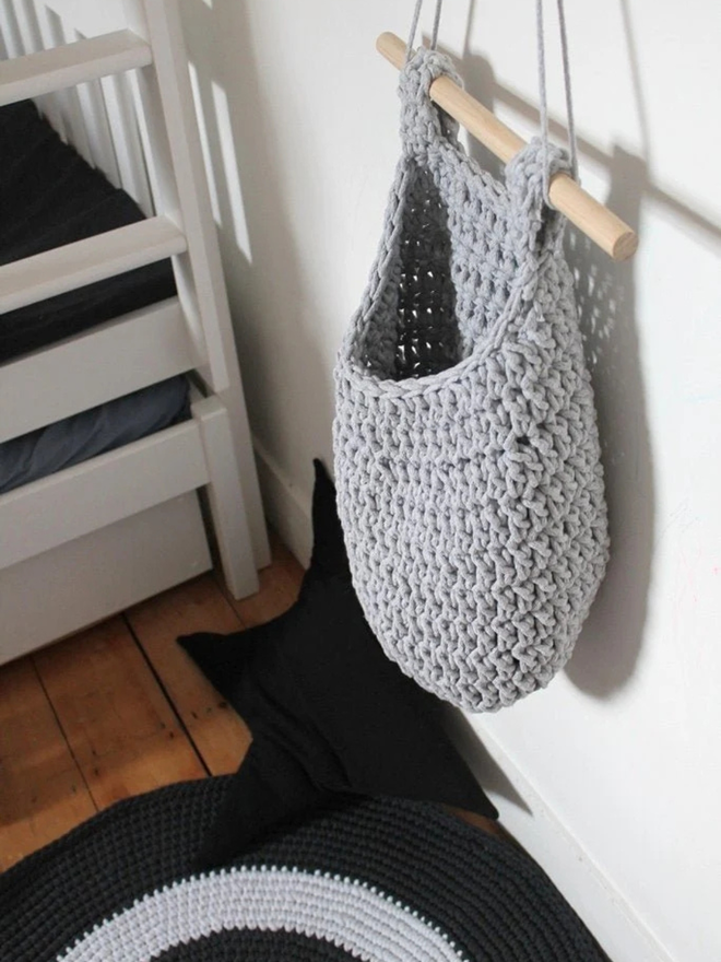 Zuri House. Large light grey hanging basket.