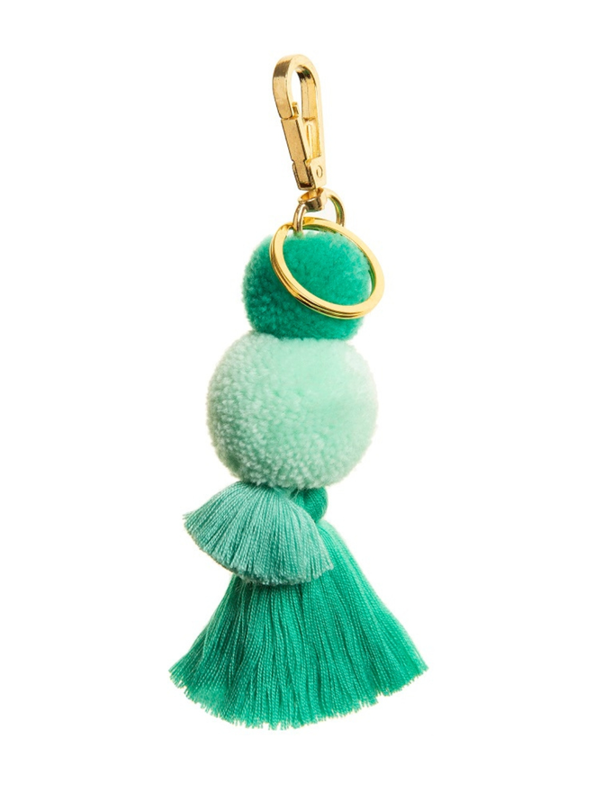 pom pom and tassel keyring. a keyring with mint green pom poms and tassels.
