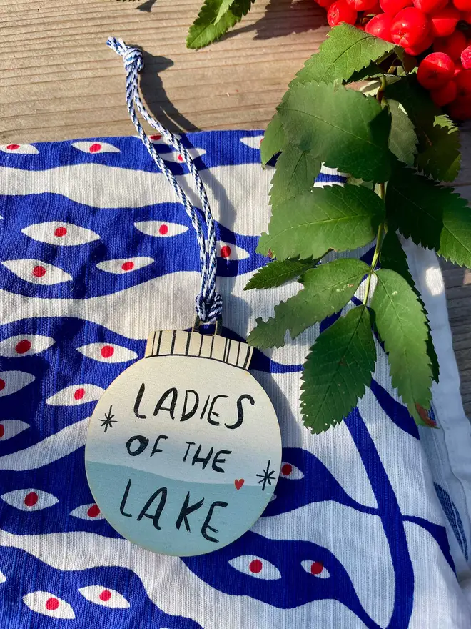 A special gift to give the lady with whom you'd get into any body of cold water, time and time again. 