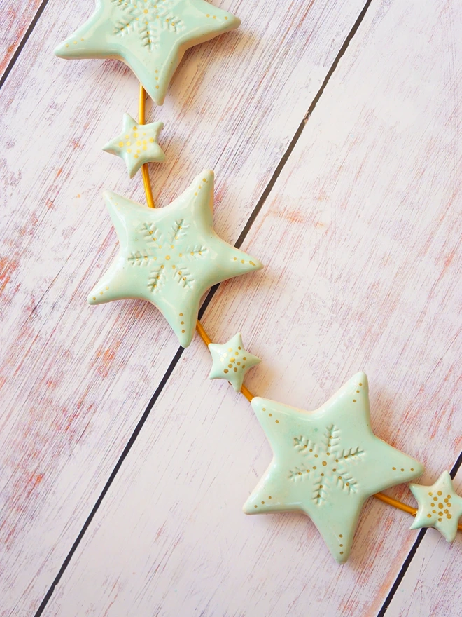christmas wreath, christmas wall hanging, christmas star decoration, christmas star, ceramic wreath, ceramic christmas decoration, Jenny Hopps Pottery, christmas decoration, christmas decor, christmas homeware, star decoration
