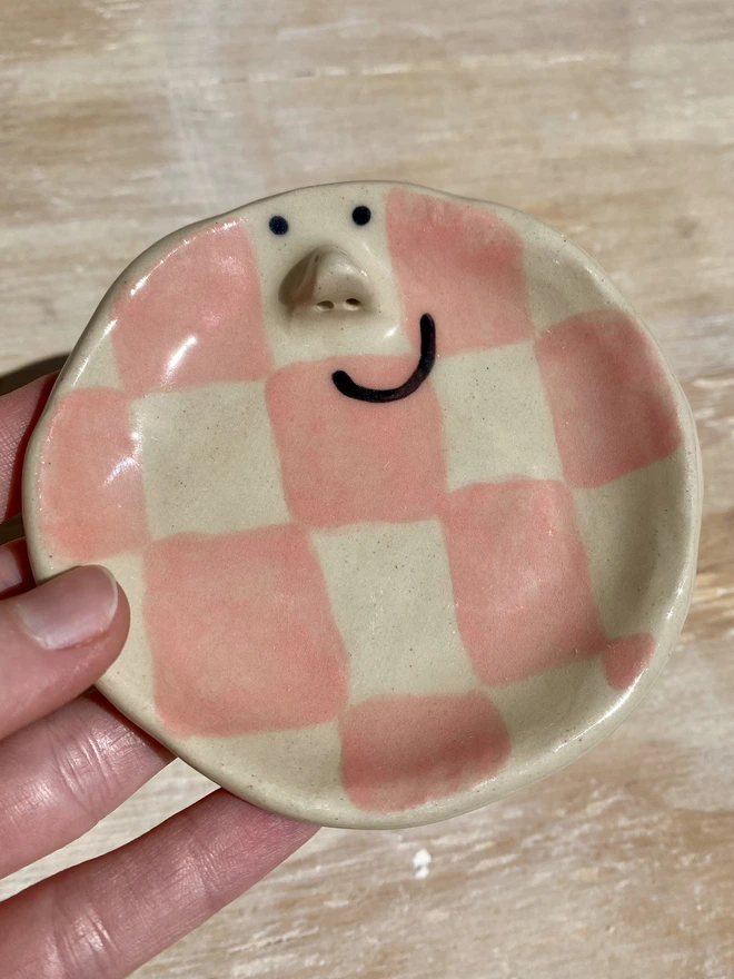 rose ceramic trinket tray - held - close up