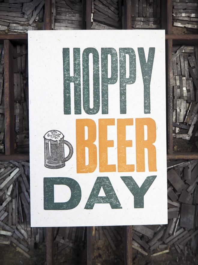 Hoppy Beer Day - Letterpress Birthday Card. Hand made letterpress birthday card, printed in orange and green on 100% recycled card using original wooden poster type.