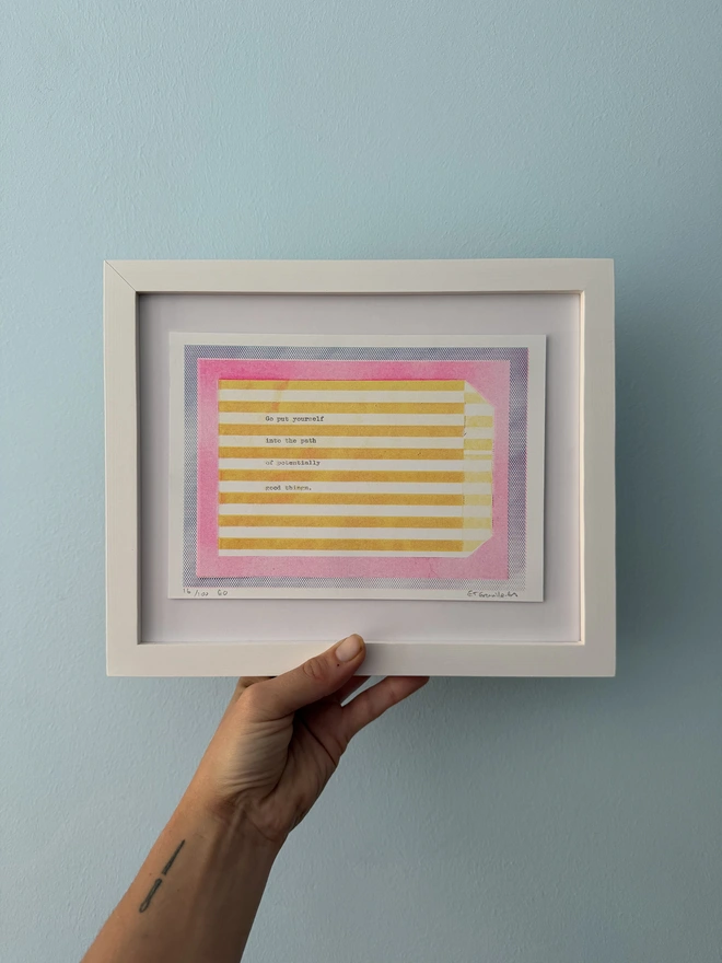 frame risograph print in orange and pink stripes