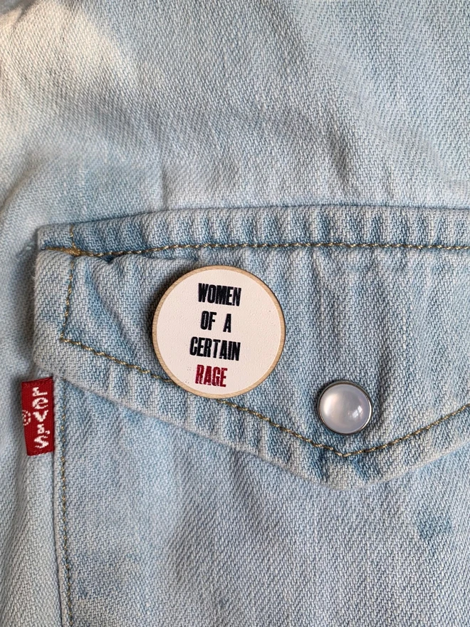wooden pin badge feminist women of a certain rage